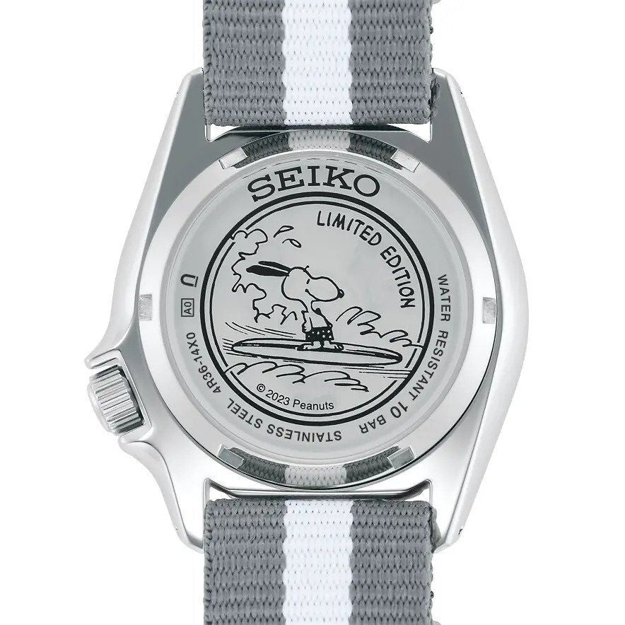 Shop Authentic Seiko 5 Sports x Peanuts Surfboard Snoopy Limited Edition White Dial Two Tone NATO Strap Watch For Men - SRPK25K1 - Luxxuri