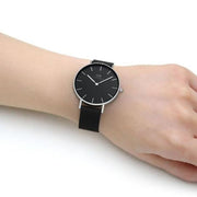  Shop Authentic Daniel Wellington Petite Ashfield Black Dial Black Mesh Strap Watch For Women - DW00100308 - Luxxuri