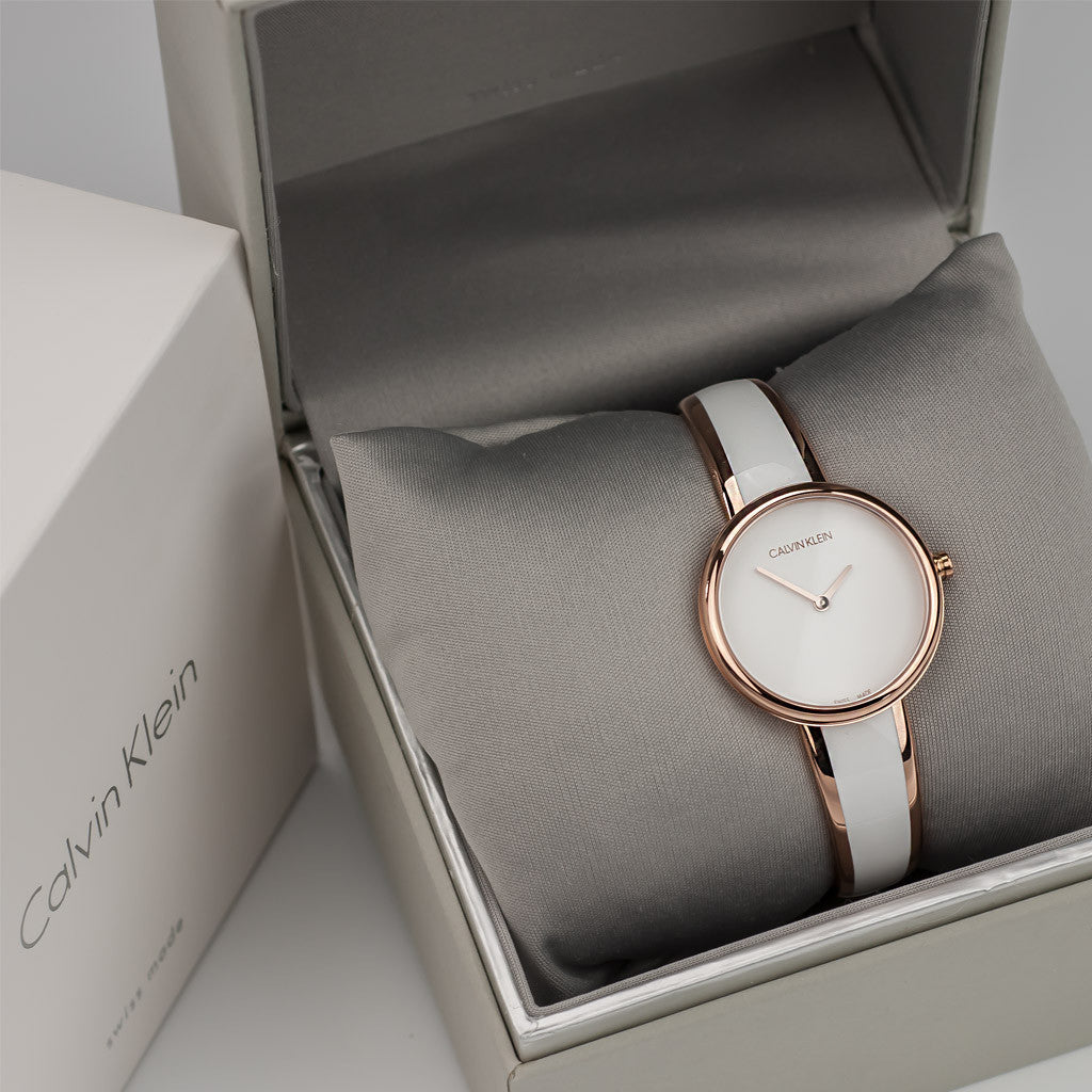  Shop Authentic Calvin Klein Seduce White Dial Two Tone Steel Strap Watch for Women - K4E2N616 - Luxxuri