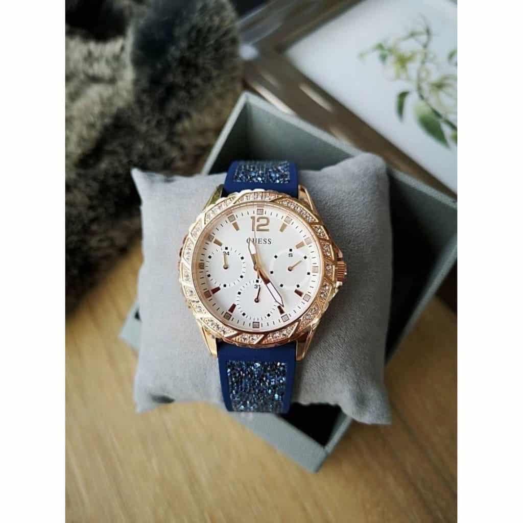  Shop Authentic Guess Swirl Analog Quartz White Dial Blue Rubber Strap Watch for Women - W1096L4 - Luxxuri
