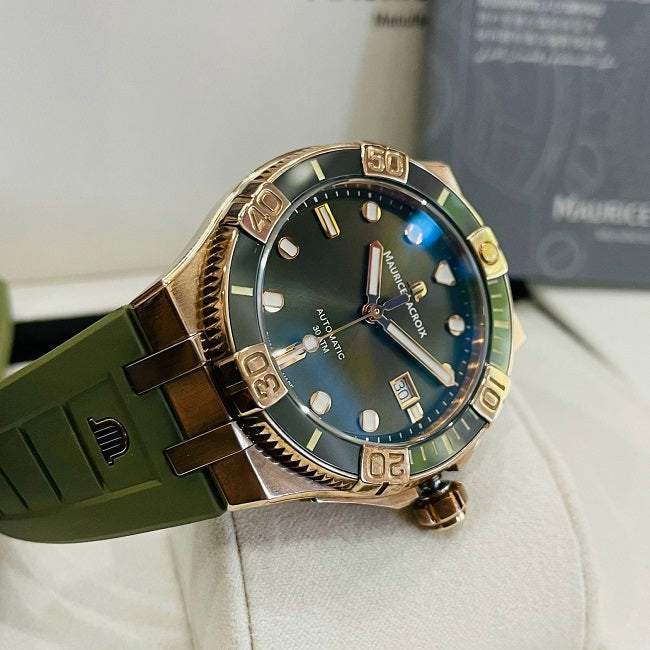  Shop Authentic Maurice Lacroix Aikon Venturer Bronze Dial Green Rubber Strap Watch For Men - AI6058-BRZ01-630-1 - Luxxuri