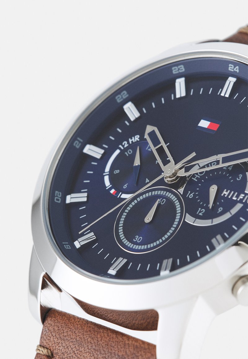  Shop Authentic Tommy Hilfiger Evan Chronograph Blue Dial Brown Leather Strap Watch for Men - 1710393 - Luxxuri