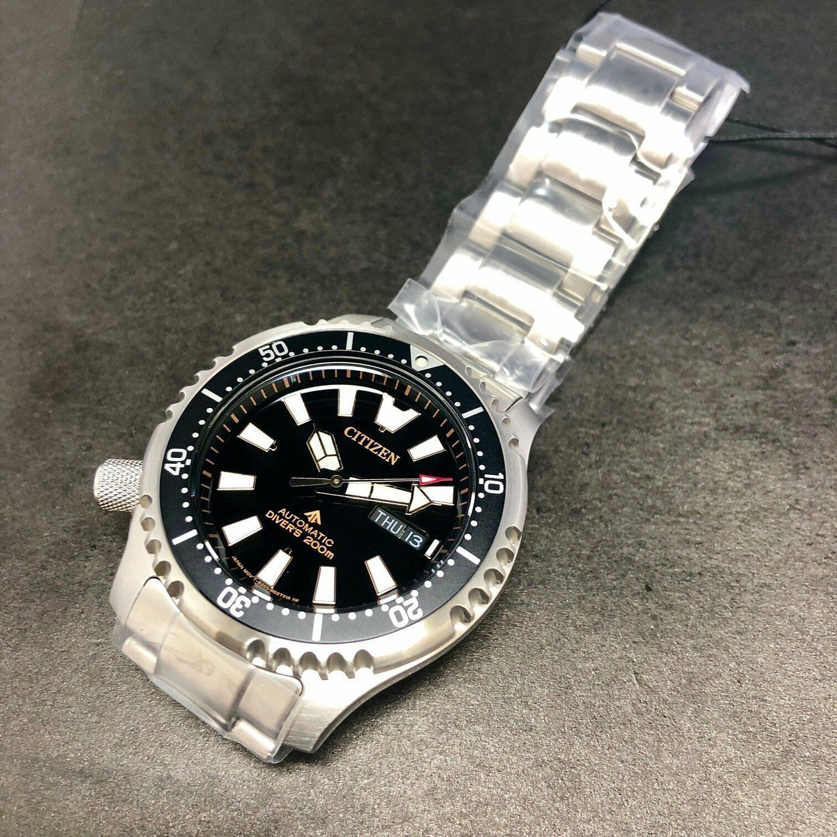  Shop Authentic Citizen Promaster 200M Diver Fugu Asian Limited Edition Black Dial Silver Steel Strap Watch For Men - NY0090-86E - Luxxuri