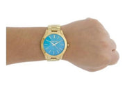  Shop Authentic Michael Kors Slim Runway Blue Mother of Pearl Dial Gold Steel Strap Watch for Women - MK3492 - Luxxuri