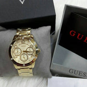  Shop Authentic Guess Crystal Multifunction Gold Dial Gold Steel Strap Watch for Women - W0778L2 - Luxxuri
