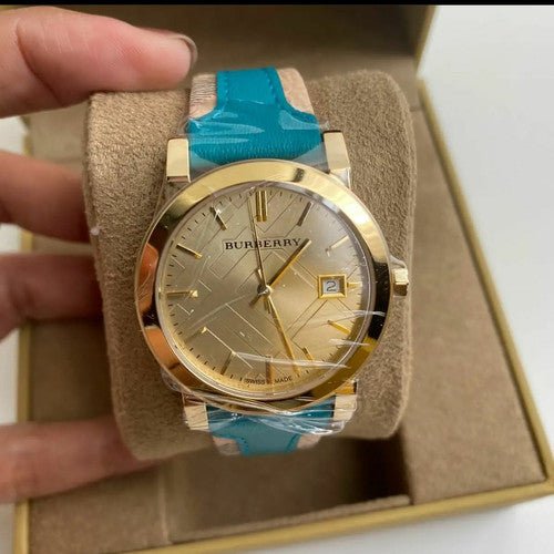  Shop Authentic Burberry The City Gold Dial Blue Leather Strap Watch for Women - BU9018 - Luxxuri