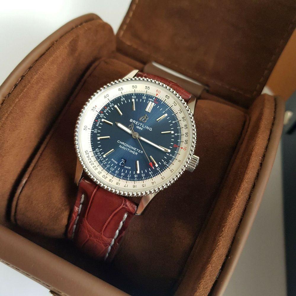  Shop Authentic Breitling Navitimer 1 Automatic 41mm Blue Dial Brown Leather Strap Mens Watch - A17326211C1P1 - Luxxuri