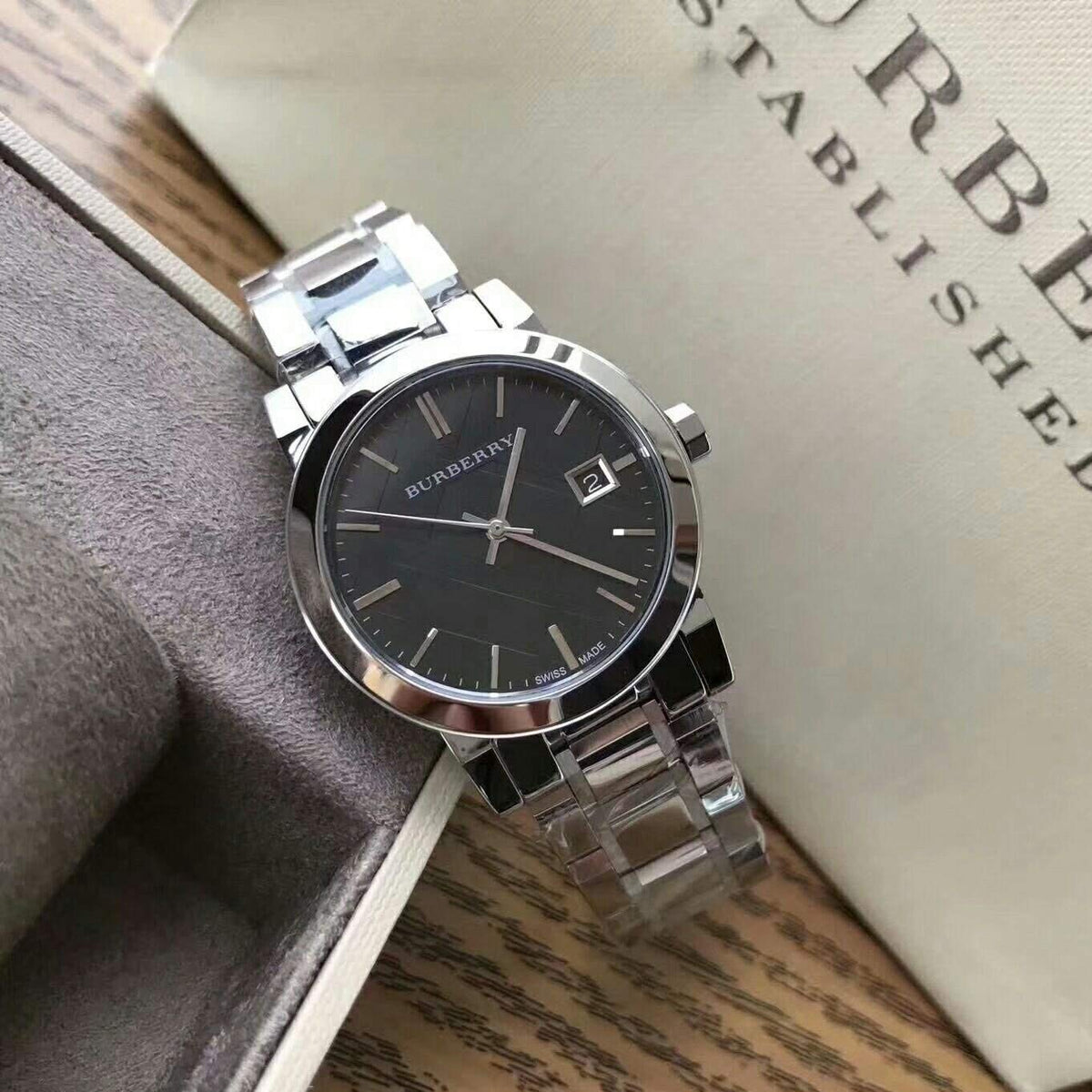  Shop Authentic Burberry The City Black Dial Silver Steel Strap Watch for Women - BU9101 - Luxxuri