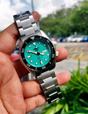  Shop Authentic Seiko 5 Sports SKX Midi Automatic Teal Dial Silver Steel Strap Watch For Men - SRPK33K1 - Luxxuri