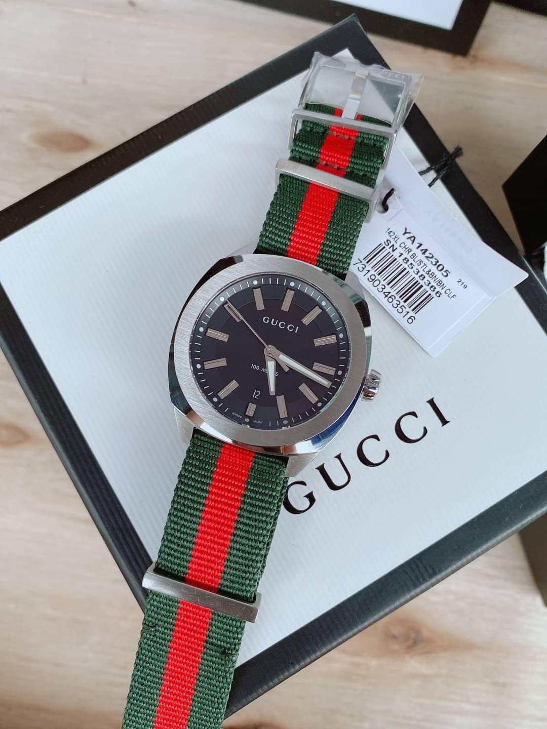 Shop Authentic Gucci GG2570 Quartz Black Dial Green & Red Nylon Strap Watch For Men - YA142305 - Luxxuri