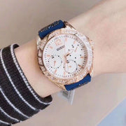  Shop Authentic Guess Swirl Analog Quartz White Dial Blue Rubber Strap Watch for Women - W1096L4 - Luxxuri
