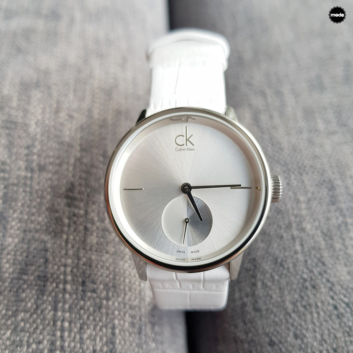  Shop Authentic Calvin Klein Accent Silver Dial White Leather Strap Watch for Women - K2Y231K6 - Luxxuri