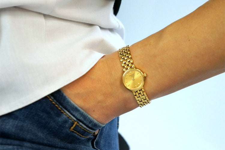  Shop Authentic Tissot Lovely Gold Dial Gold Steel Strap Watch For Women - T058.009.33.021.00 - Luxxuri