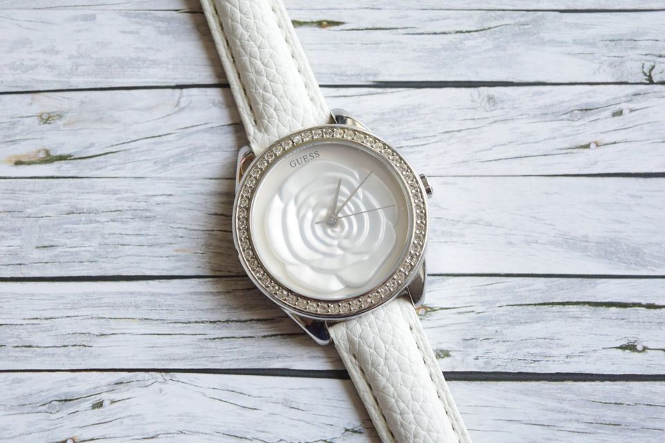  Shop Authentic Guess Rosette Analog White Dial White Leather Strap Watch For Women - W75043L1 - Luxxuri