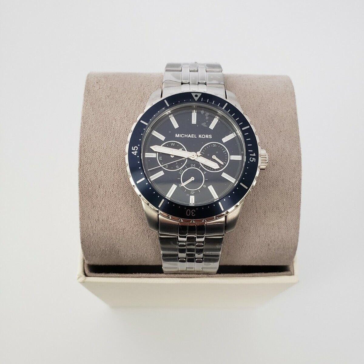  Shop Authentic Michael Kors Cunningham Multifunction Blue Dial Silver Steel Strap Watch For Men - MK7153 - Luxxuri