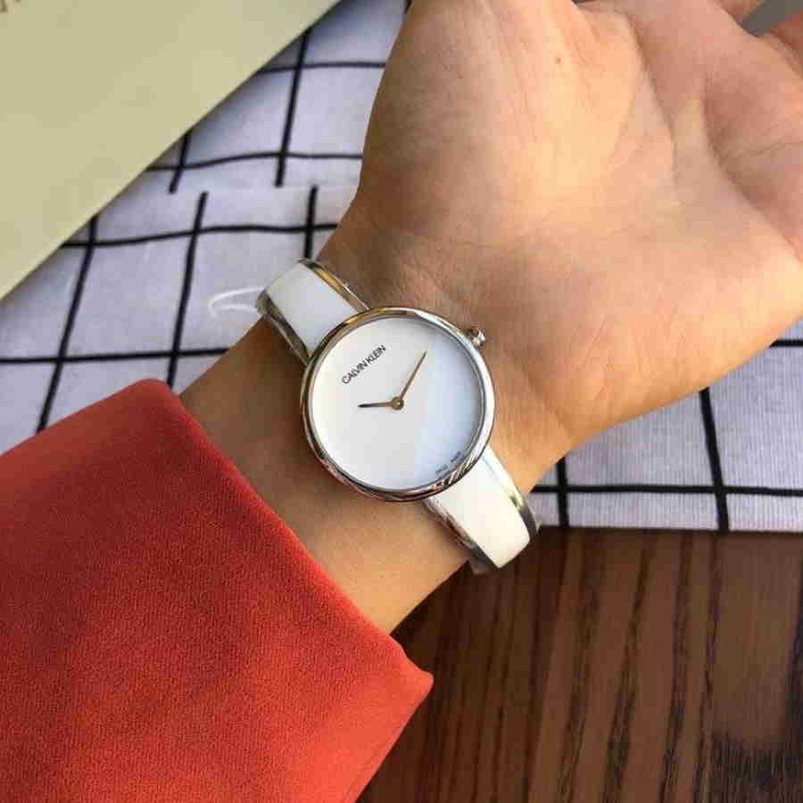  Shop Authentic Calvin Klein Seduce White Dial Two Tone Steel Strap Watch for Women - K4E2N116 - Luxxuri