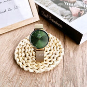  Shop Authentic Daniel Wellington Petite Emerald Green Dial Gold Mesh Strap Watch For Women - DW00100481 - Luxxuri