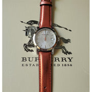  Shop Authentic Burberry The City Silver Dial Orange Leather Strap Watch for Women - BU9121 - Luxxuri