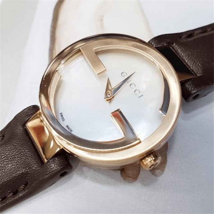  Shop Authentic Gucci G Interlocking Mother of Pearl Dial Brown Leather Strap Watch For Women - YA133516 - Luxxuri