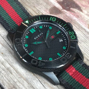  Shop Authentic Gucci G Timeless Sport Black Dial Two Tone NATO Strap Watch For Men - YA126229 - Luxxuri