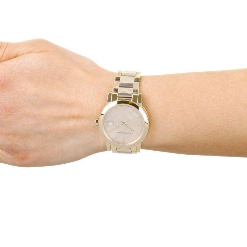  Shop Authentic Burberry The City Gold Dial Gold Steel Strap Watch for Women - BU9145 - Luxxuri