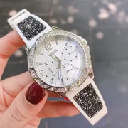  Shop Authentic Guess Swirl Quartz Silver Dial White Silicone Strap Watch for Women - W1096L1 - Luxxuri