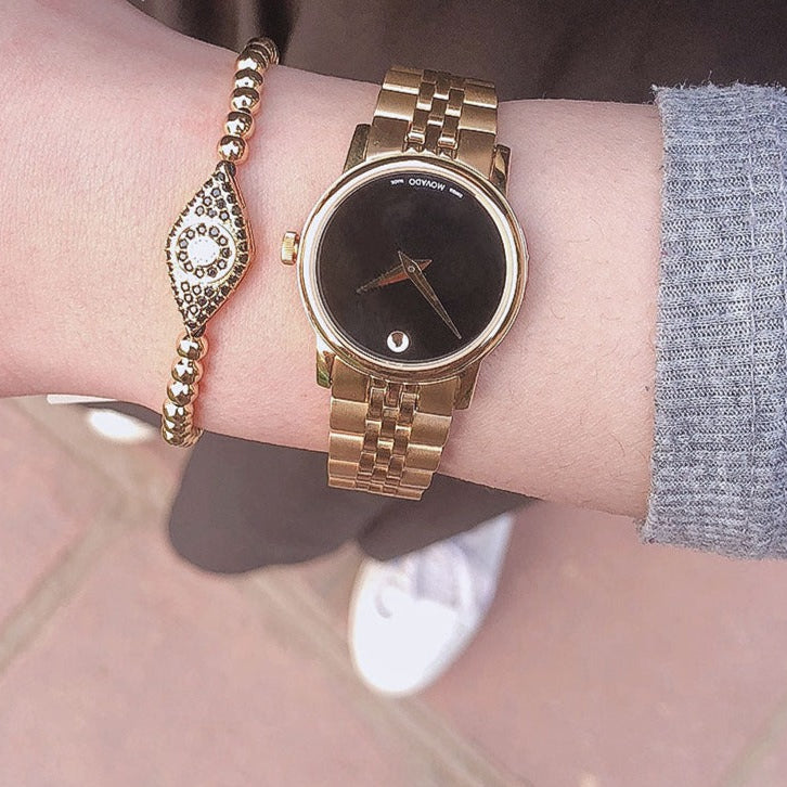  Shop Authentic Movado Museum Classic Quartz Black Dial Gold Steel Strap Watch For Women - 0607005 - Luxxuri