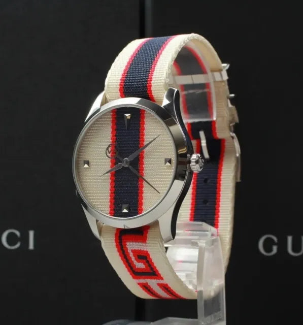  Shop Authentic Gucci G Timeless Quartz White Dial Two Tone NATO Strap Watch For Men - YA1264071 - Luxxuri