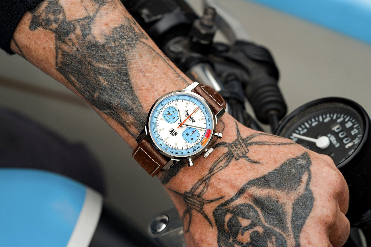  Shop Authentic Breitling Top Time Deus Limited Edition White Dial Brown Leather Strap Watch for Men - A233112A1A1X1 - Luxxuri