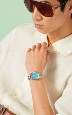  Shop Authentic Gucci G Timeless Quartz Turquoise Dial Silver Steel Strap Unisex Watch - YA1265044 - Luxxuri