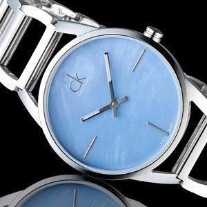  Shop Authentic Calvin Klein Stately Blue Mother of Pearl Dial Silver Steel Strap Watch for Women - K3G2312N - Luxxuri
