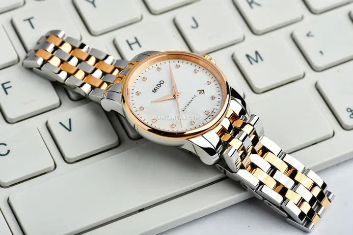 Shop Authentic Mido Baroncelli III Automatic Mother of Pearl White Dial Two Tone Steel Strap Watch For Women - M7600.9.69.1 - Luxxuri