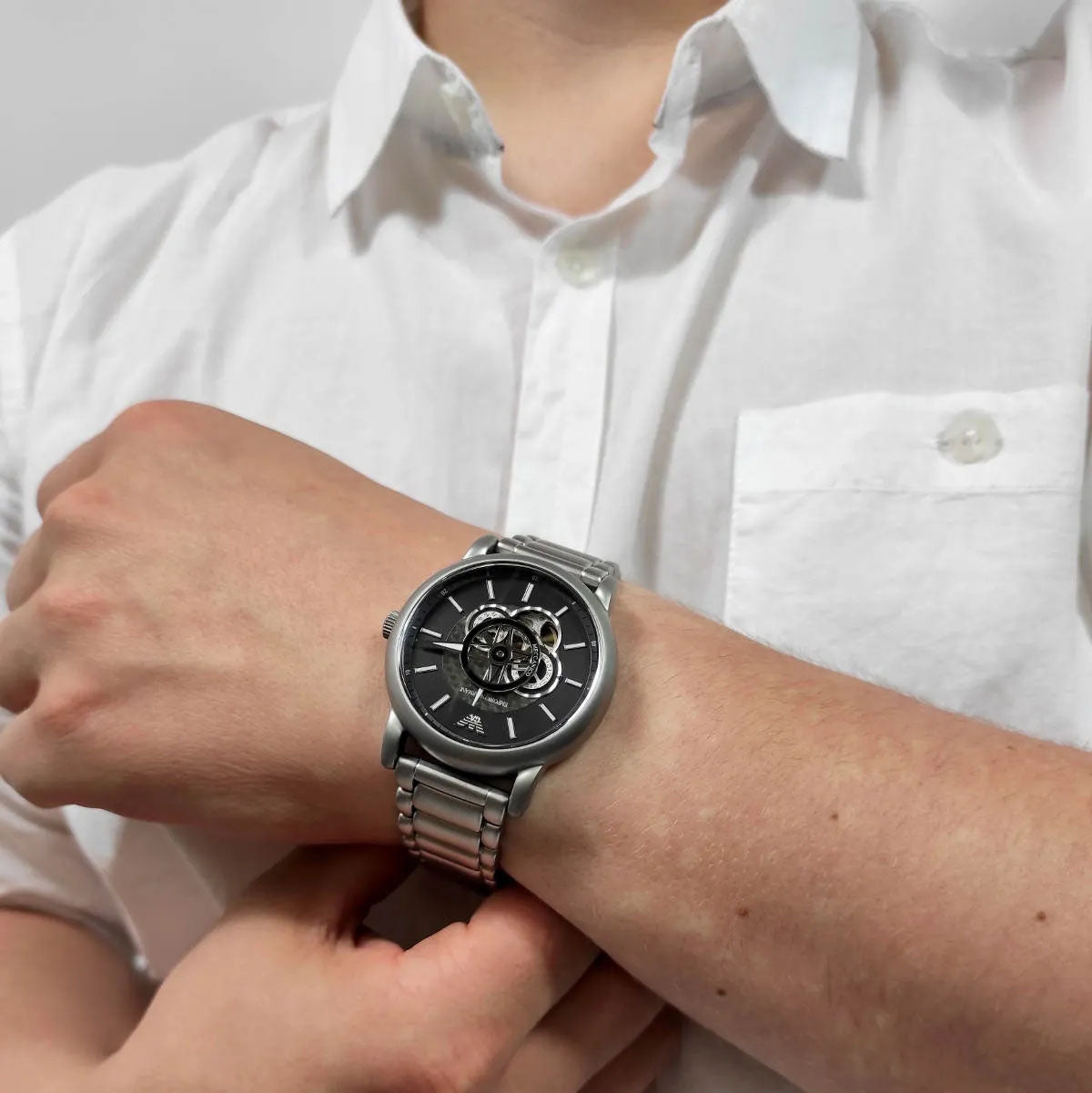  Shop Authentic Emporio Armani Meccanico Automatic Skeleton Black Dial Silver Steel Strap Watch For Men - AR60021 - Luxxuri