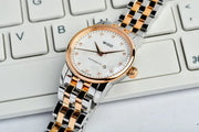  Shop Authentic Mido Baroncelli III Automatic White Dial Two Tone Steel Strap Watch For Women - M7600.9.N6.1 - Luxxuri