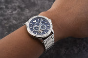  Shop Authentic Emporio Armani Mario Chronograph Automatic Blue Dial Silver Steel Strap Watch For Men - AR60052 - Luxxuri