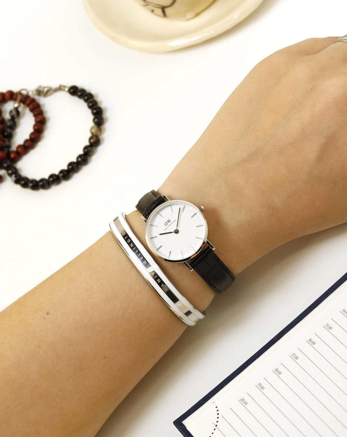  Shop Authentic Daniel Wellington Classic Petite Reading White Dial Black Leather Strap Watch For Women - DW00100241 - Luxxuri