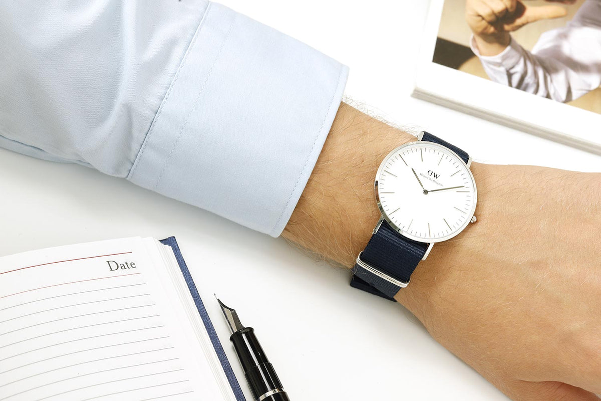  Shop Authentic Daniel Wellington Classic Bayswater White Dial Blue NATO Strap Watch For Men - DW00100276 - Luxxuri