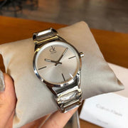  Shop Authentic Calvin Klein Stately Silver Dial Silver Steel Strap Watch for Women - K3G23128 - Luxxuri