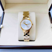  Shop Authentic Calvin Klein Snake Silver Dial Yellow Gold Steel Strap Watch For Women - K6E23546 - Luxxuri