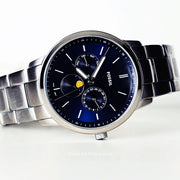  Shop Authentic Fossil Neutra Minimalist Moonphase Blue Dial Silver Steel Strap Watch for Men - FS5907 - Luxxuri