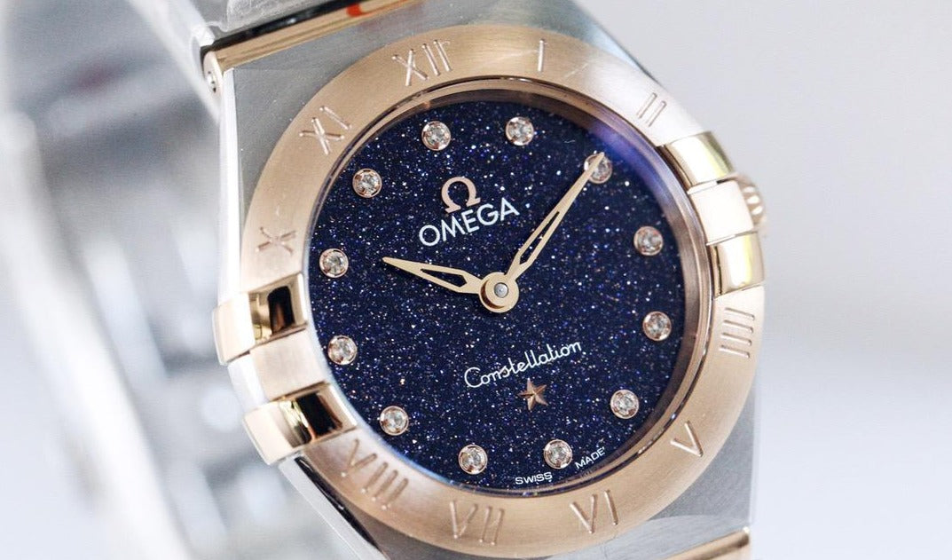  Shop Authentic Omega Constellation Quartz Diamonds Blue Dial Two Tone Steel Strap Watch for Women - 131.20.25.60.53.002 - Luxxuri