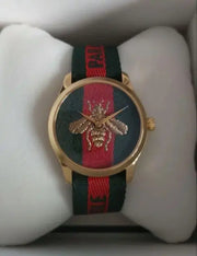  Shop Authentic Gucci G Timeless Quartz Green & Red Dial Green & Red NATO Strap Watch For Men - YA126487A - Luxxuri