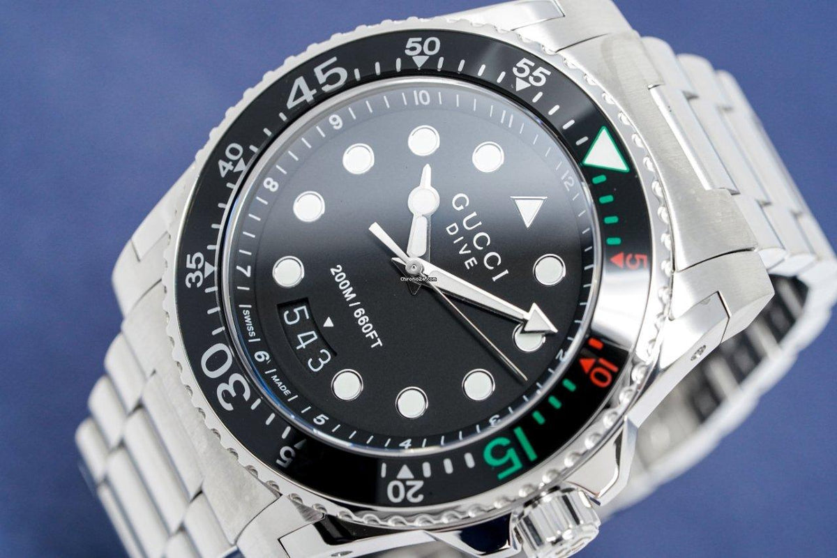  Shop Authentic Gucci Dive Analog Black Dial Silver Steel Strap Watch For Men - YA136208 - Luxxuri