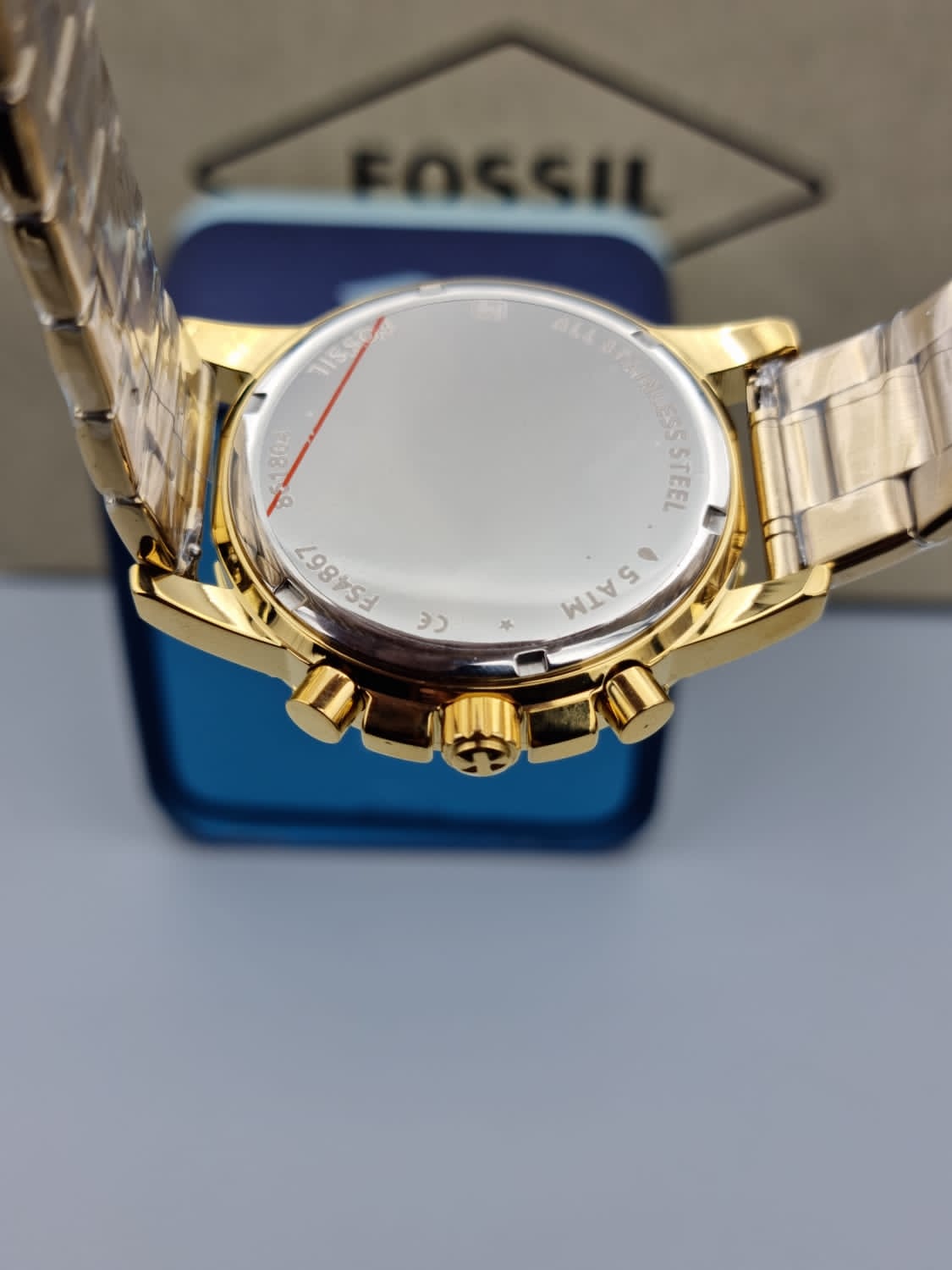  Shop Authentic Fossil Dean Chronograph Champagne Dial Gold Steel Strap Watch for Men - FS4867 - Luxxuri