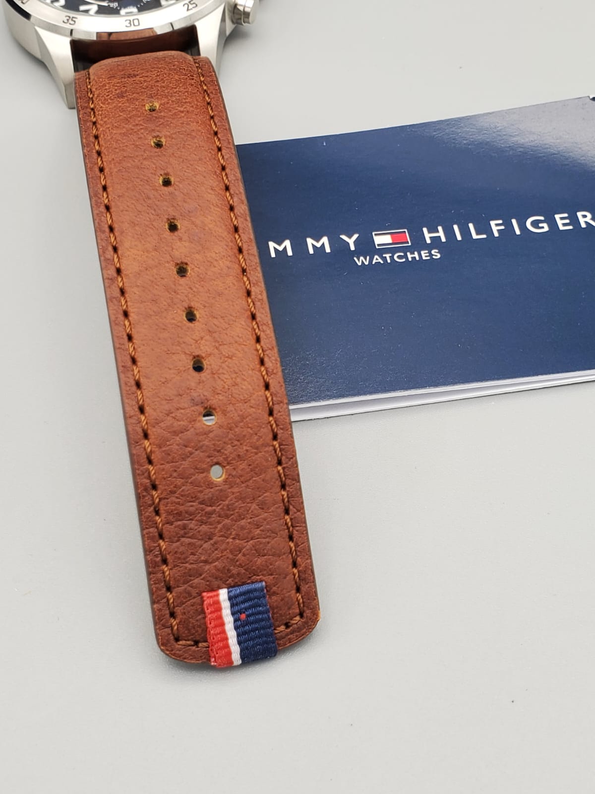  Shop Authentic Tommy Hilfiger Trent Quartz Blue Dial Brown Leather Strap Watch for Men - 1791066 - Luxxuri