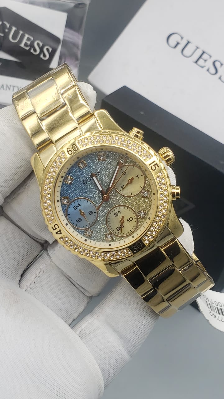  Shop Authentic Guess Confetti Diamonds Gold Dial Gold Steel Strap Watch for Women - W0774L2 - Luxxuri