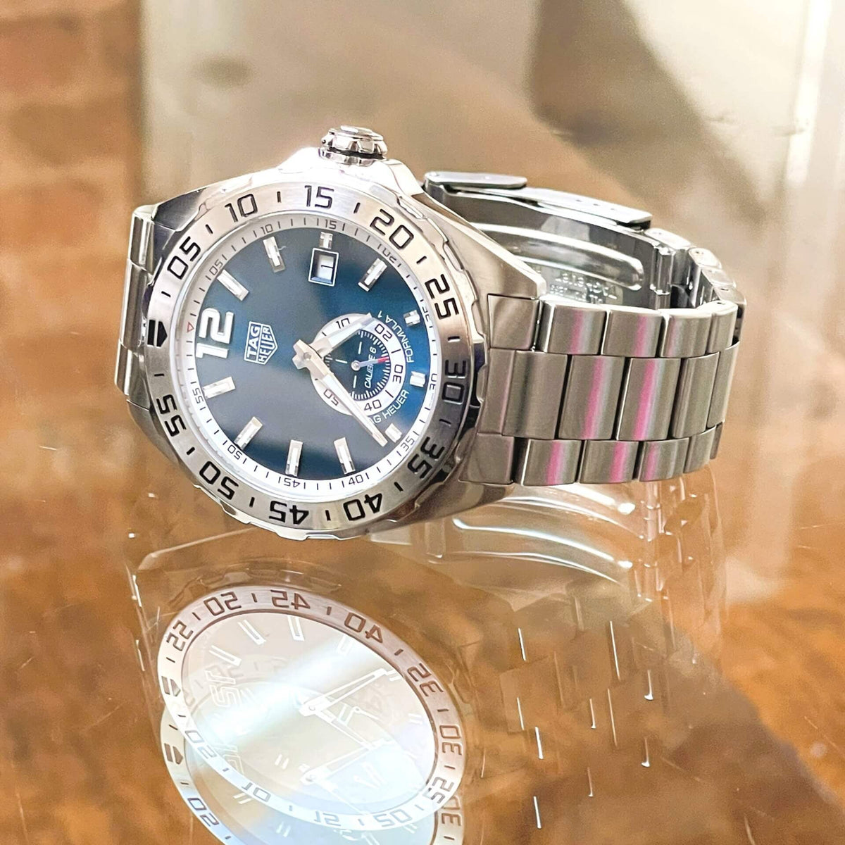  Shop Authentic Tag Heuer Formula 1 Calibre 6 Automatic Blue Dial Silver Steel Strap Watch for Men - WAZ2014.BA0842 - Luxxuri