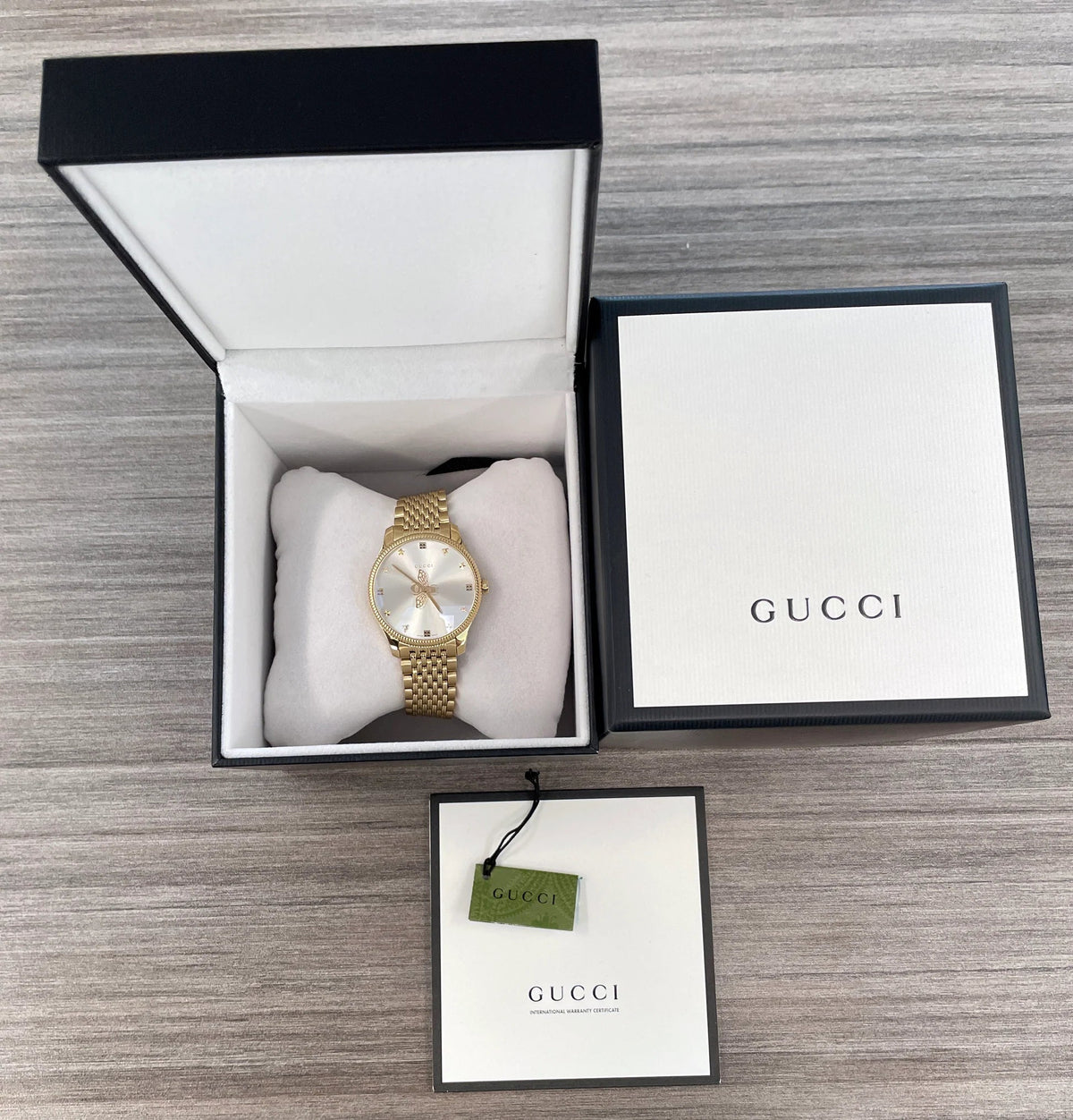  Shop Authentic Gucci G Timeless Quartz Silver Dial Gold Steel Strap Watch For Women - YA1264155 - Luxxuri