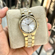 Shop Authentic Michael Kors Lenox Three Hand Silver Dial Gold Steel Strap Watch For Women - MK7361 - Luxxuri