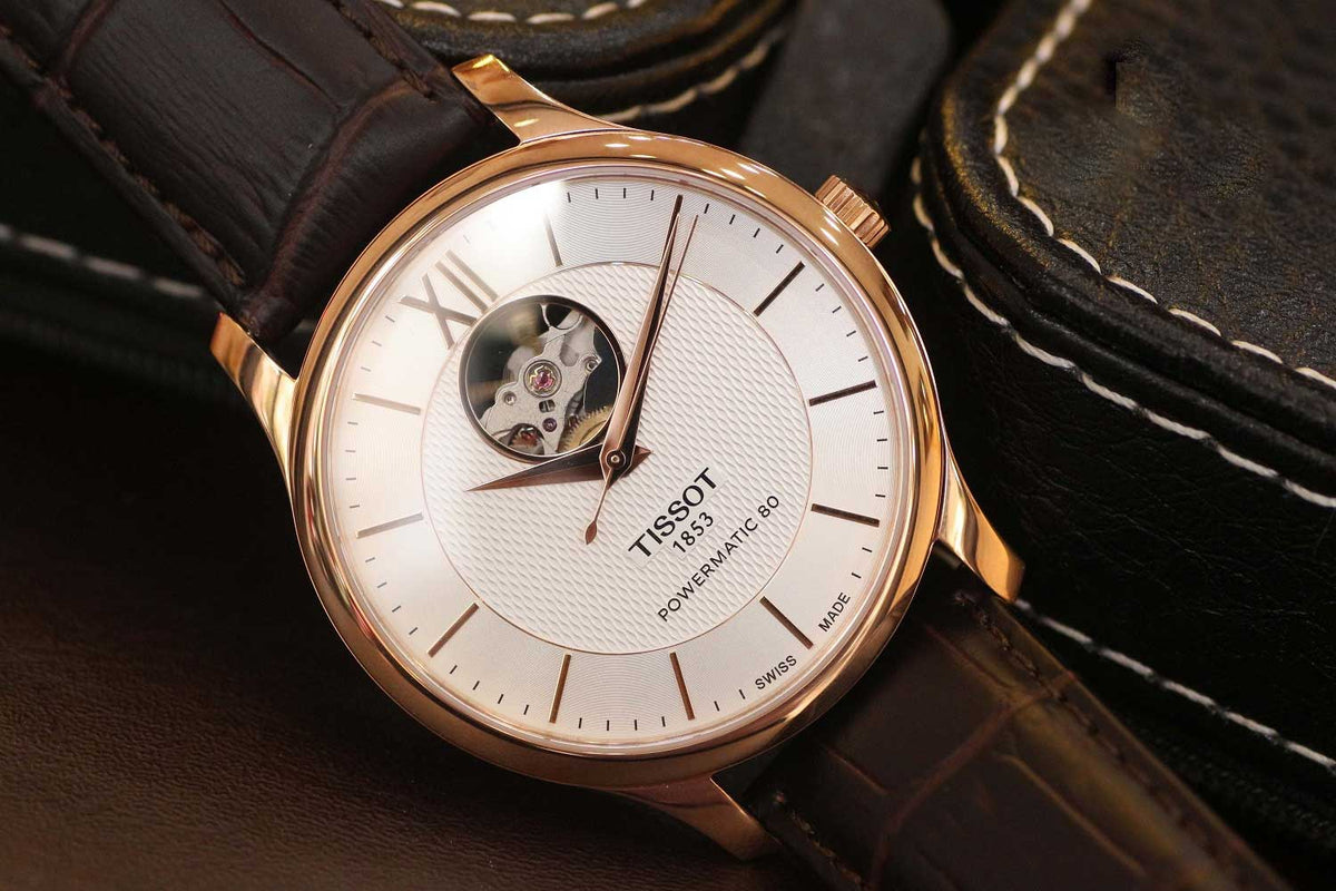  Shop Authentic Tissot Tradition Powermatic 80 Open Heart Silver Dial Brown Leather Strap Watch For Men - T063.907.36.038.00 - Luxxuri